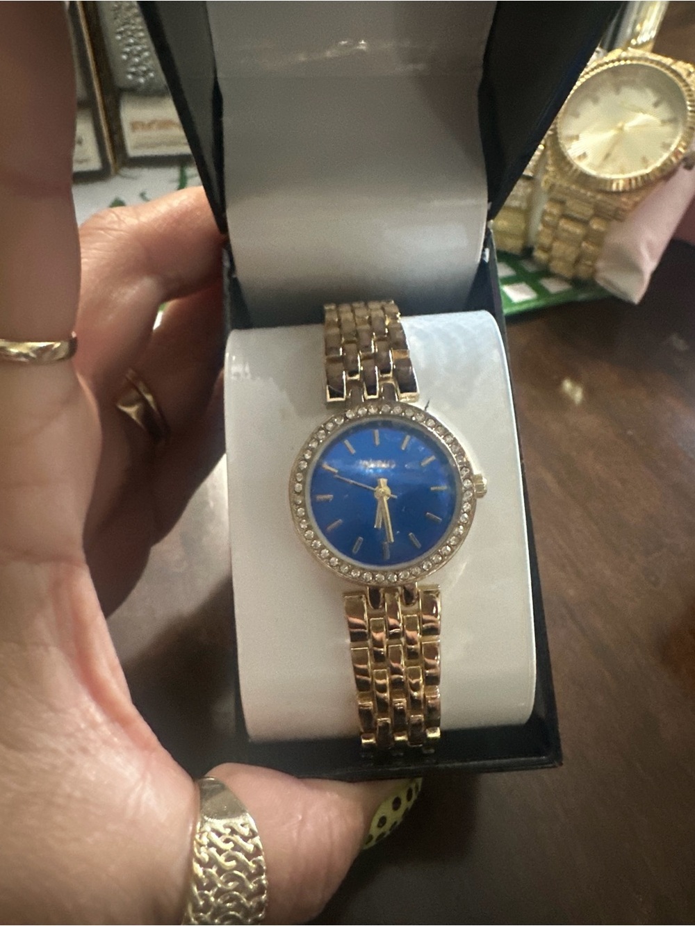 XOXO Gold Tone Bracelet Watch with Blue Dial and Crystal Accents